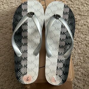 Michael Kors flip flops like new